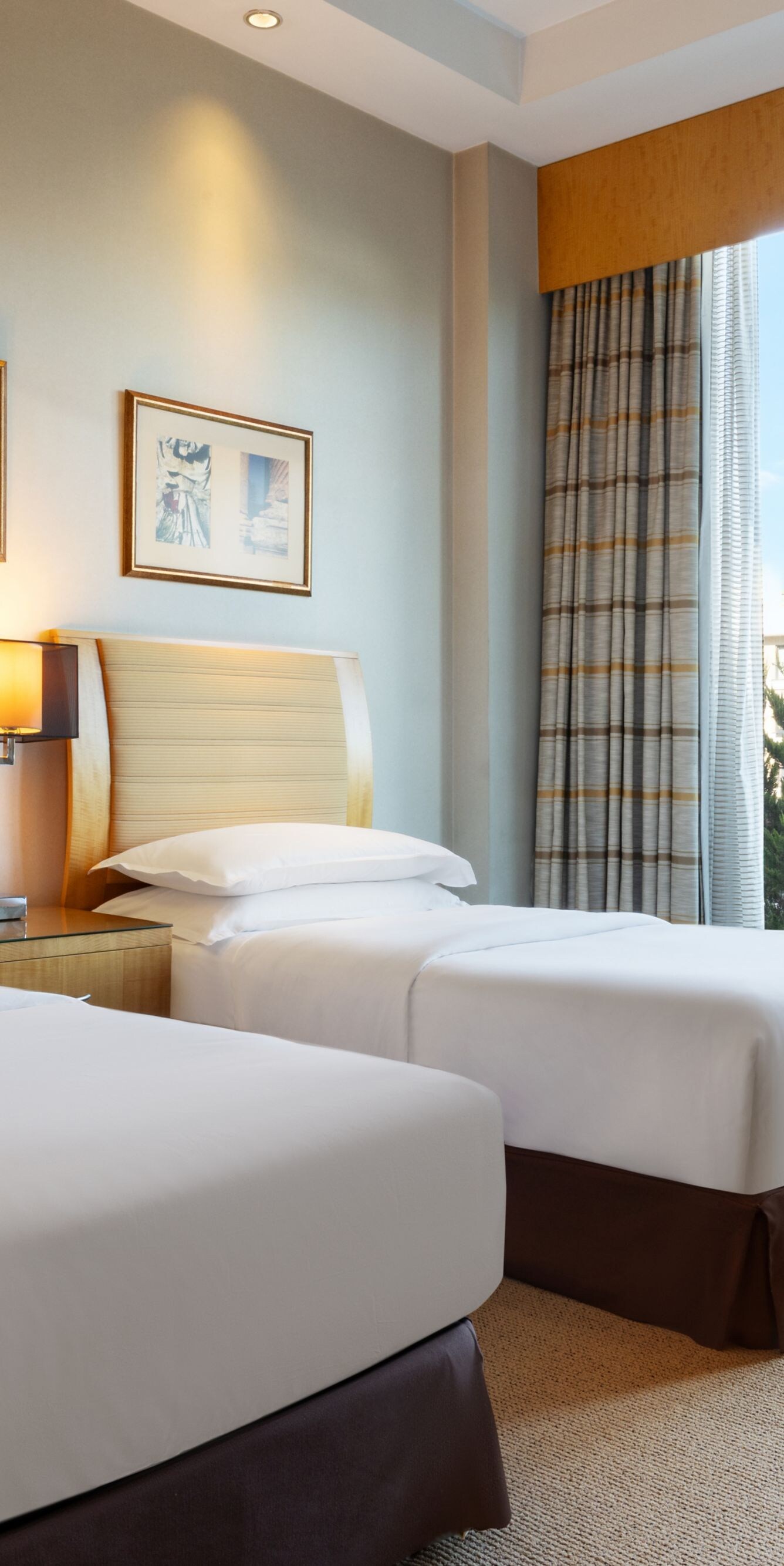 Two Bedroom Suite twin beds with city view