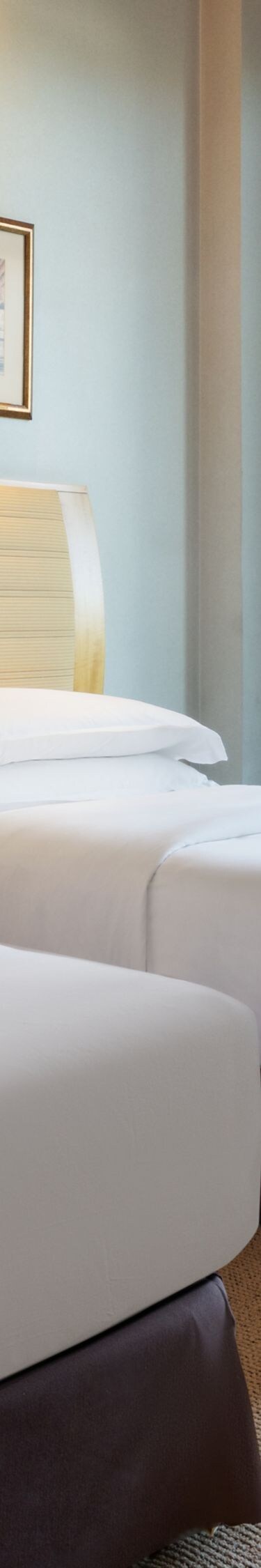 Two Bedroom Suite twin beds with city view