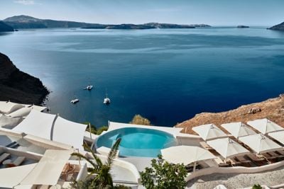 Infinity pool above a coastal landscape