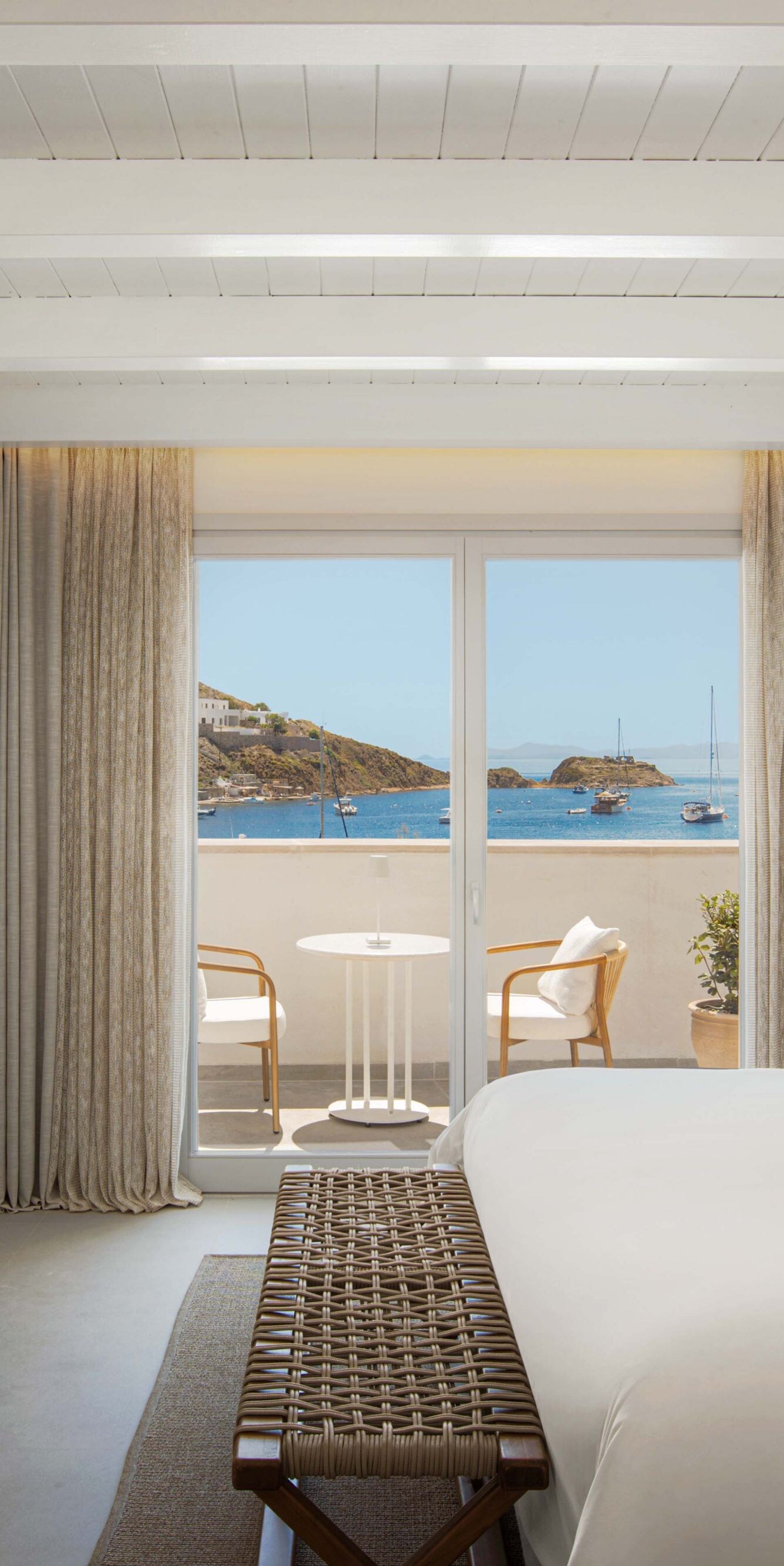Elegant bedroom with balcony and landmark view