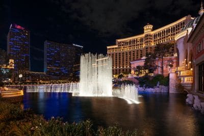 Fountains at night in front of Bellagio building.