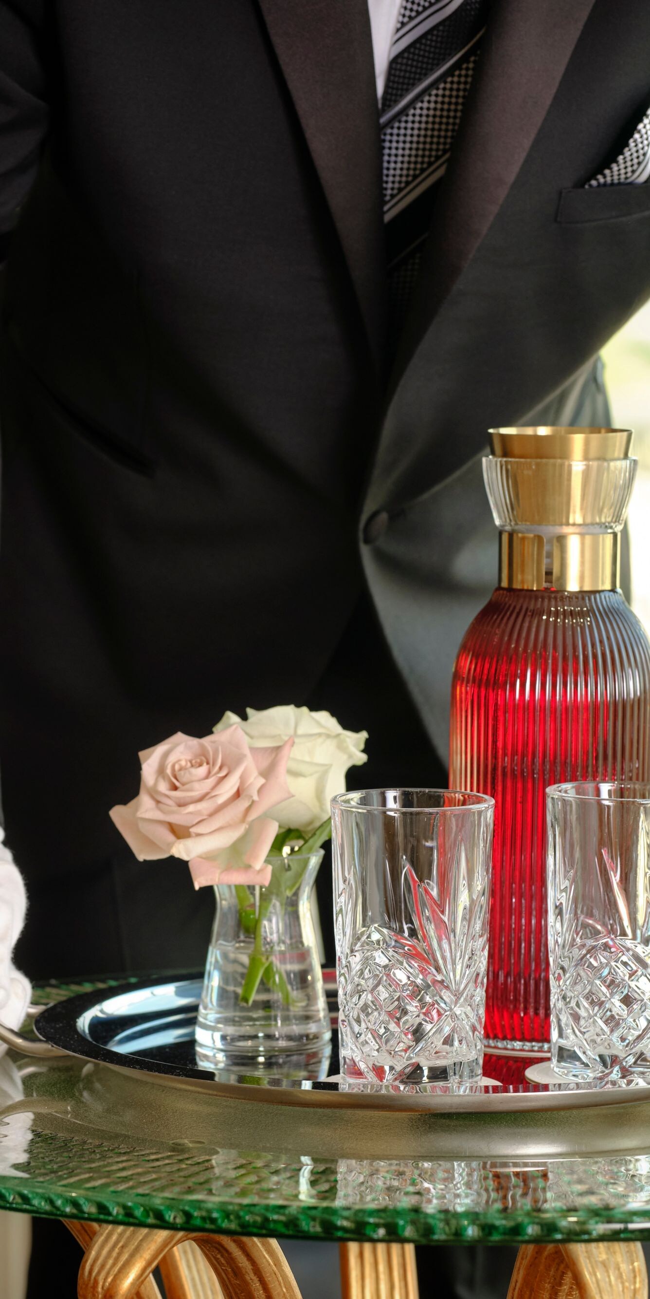 The Park Tower Butler serving refreshments to the room