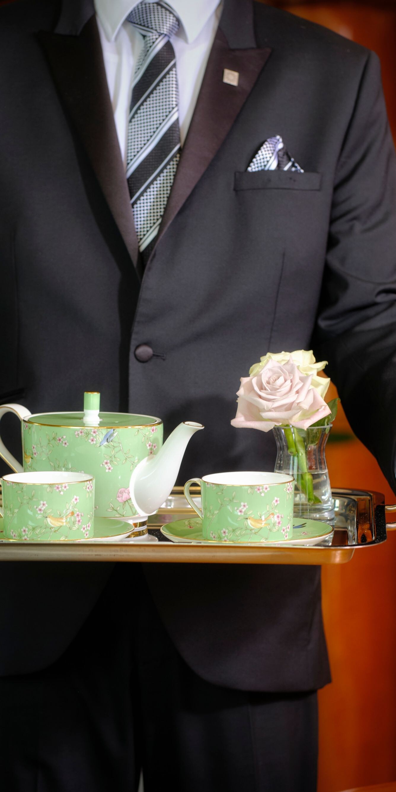 The Park Tower Butler serving refreshments to the room