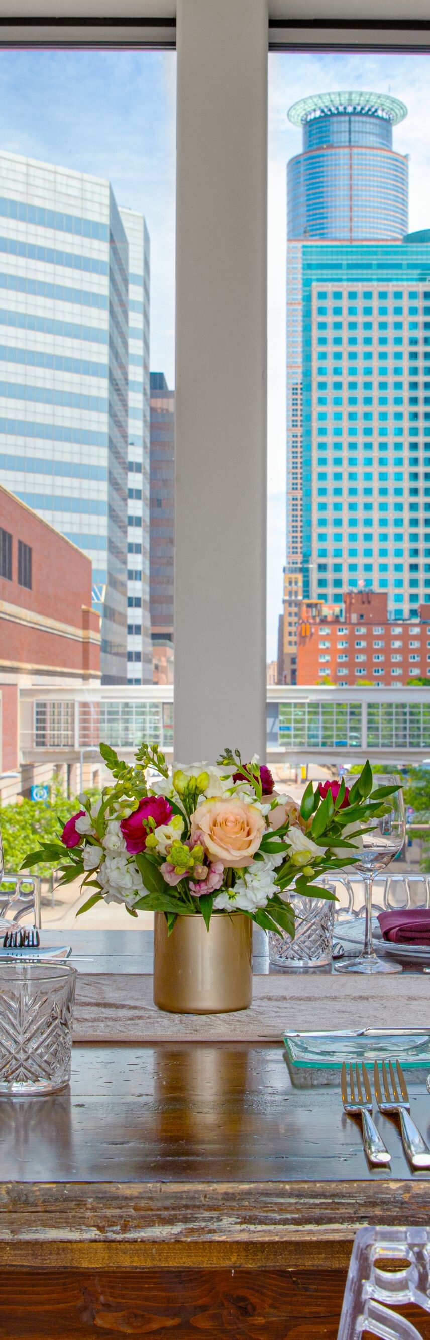 Close up of glassware, city backdrop