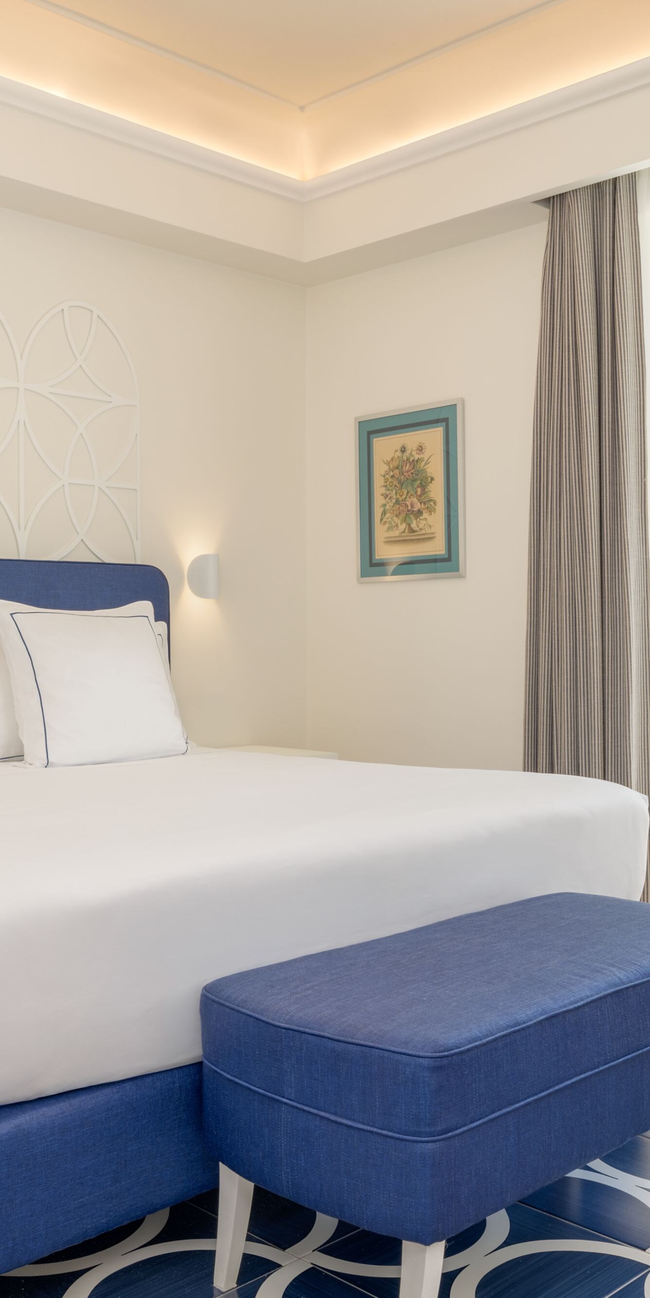 Guest room with king bed and patio garden view