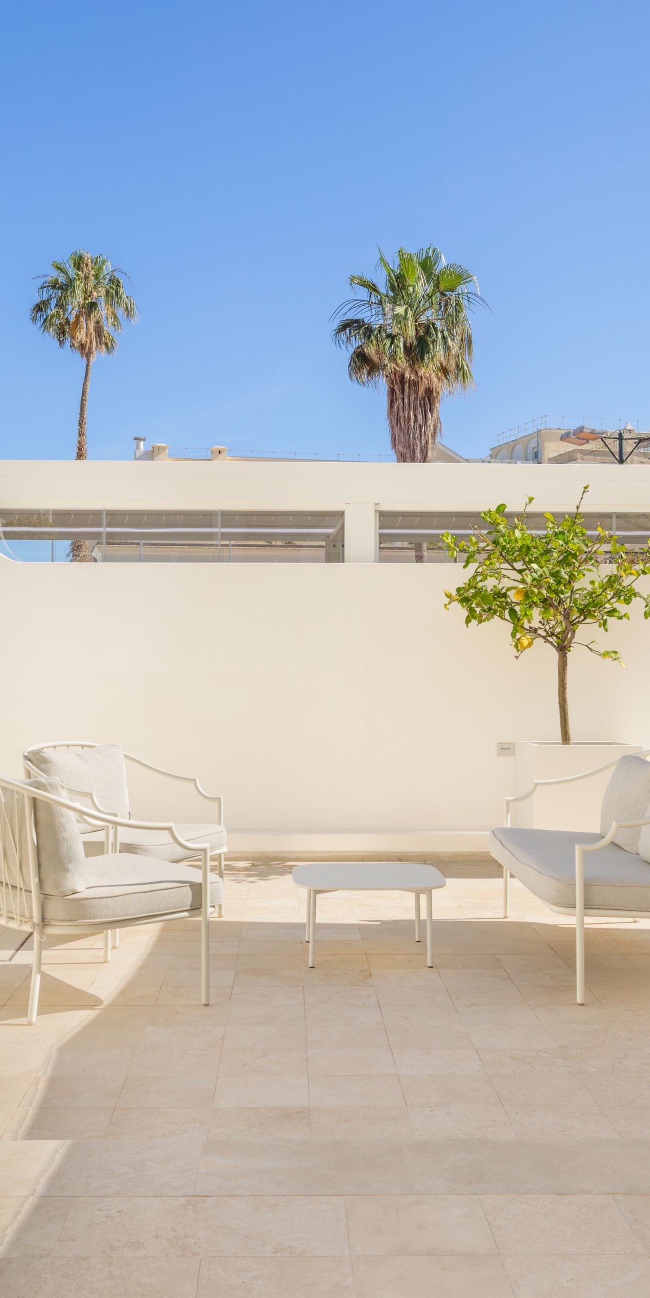 Private patio with seating area and plunge pool 
