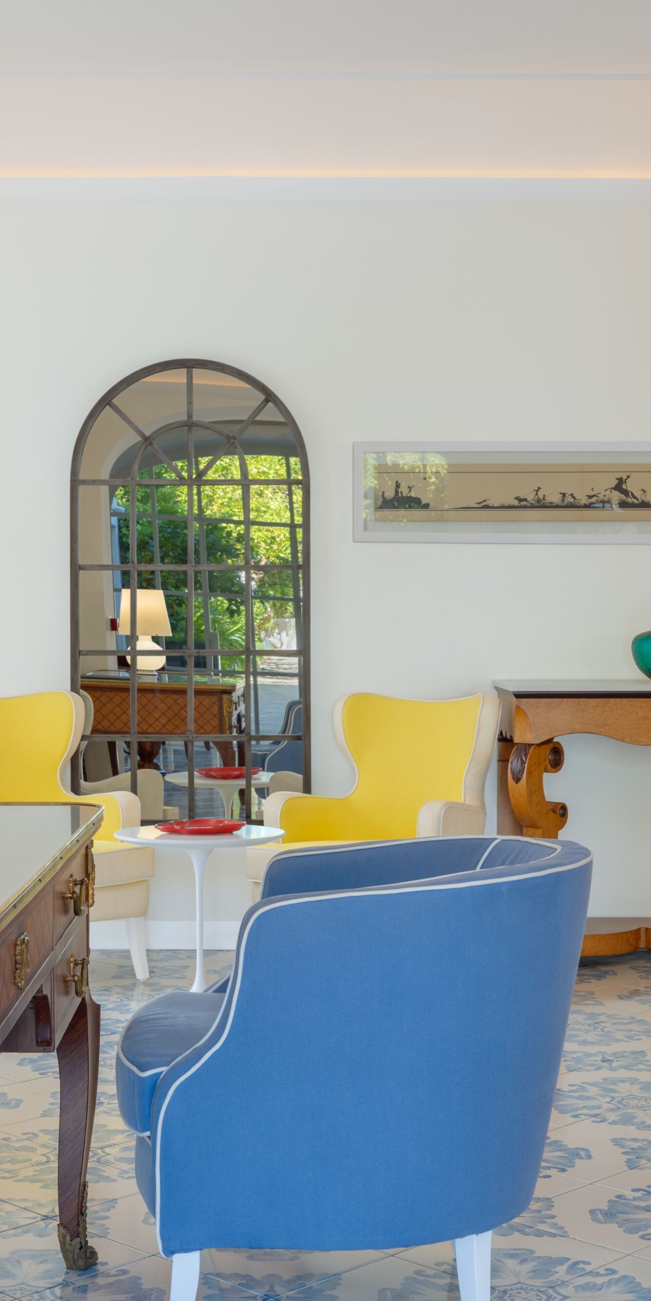 Elegant lobby seating area with colorful chairs