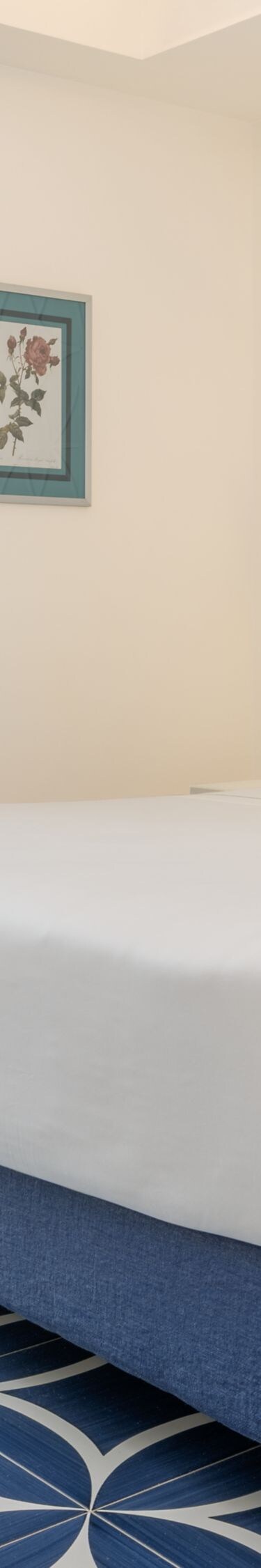 Guest room with king bed and private patio view