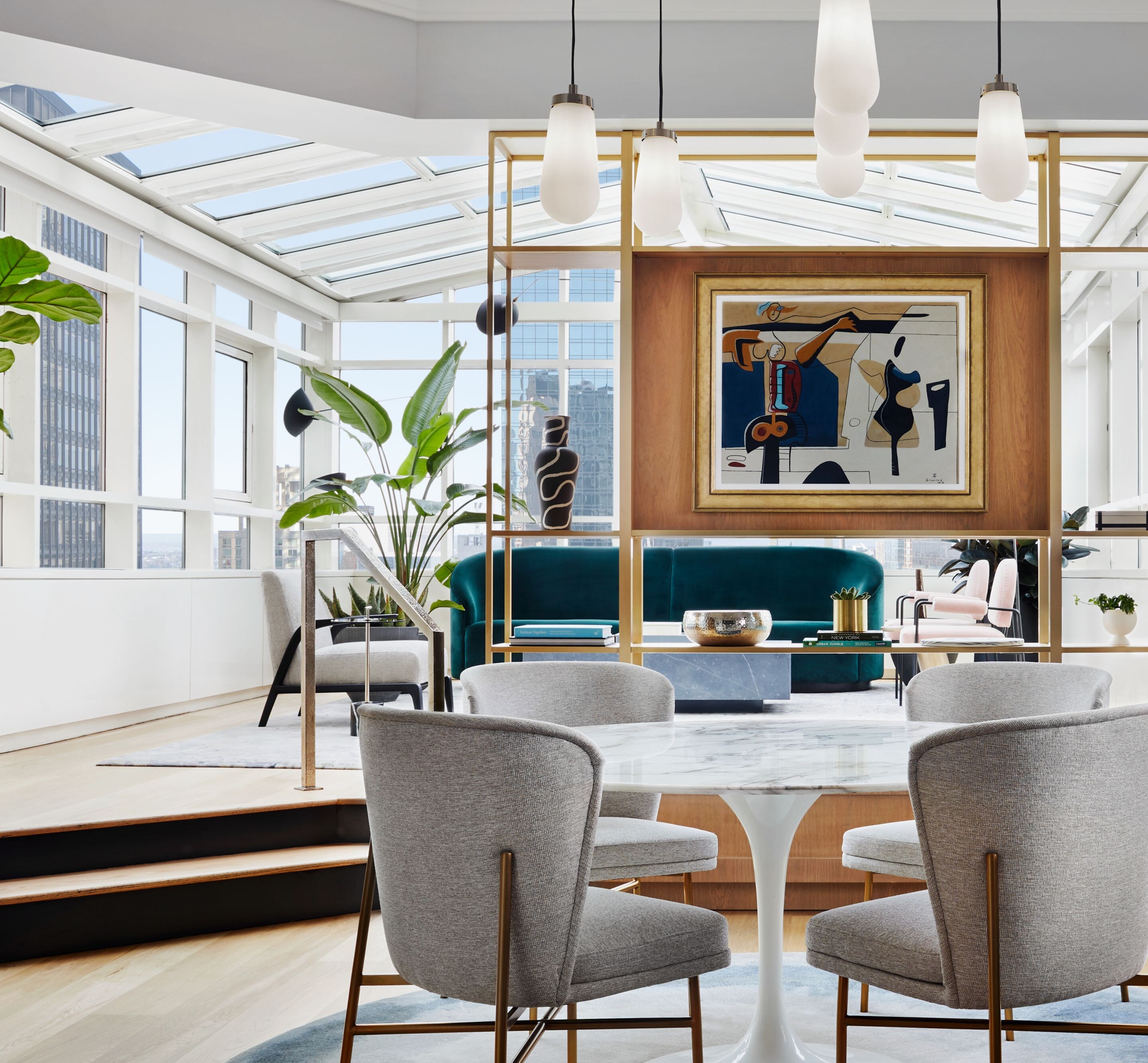 Atrium suite with dining area and lounge seating