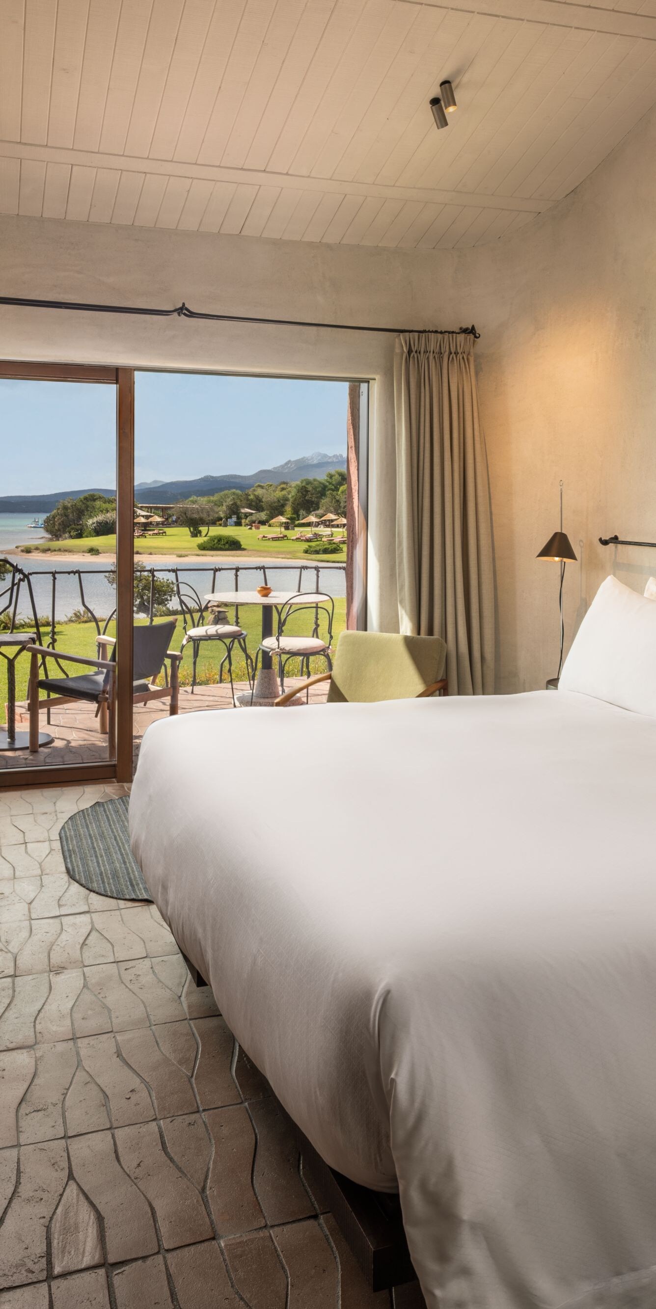 King guest room with terrace and lake view