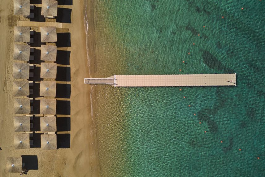  Cosme private beach club,floating dock drone view