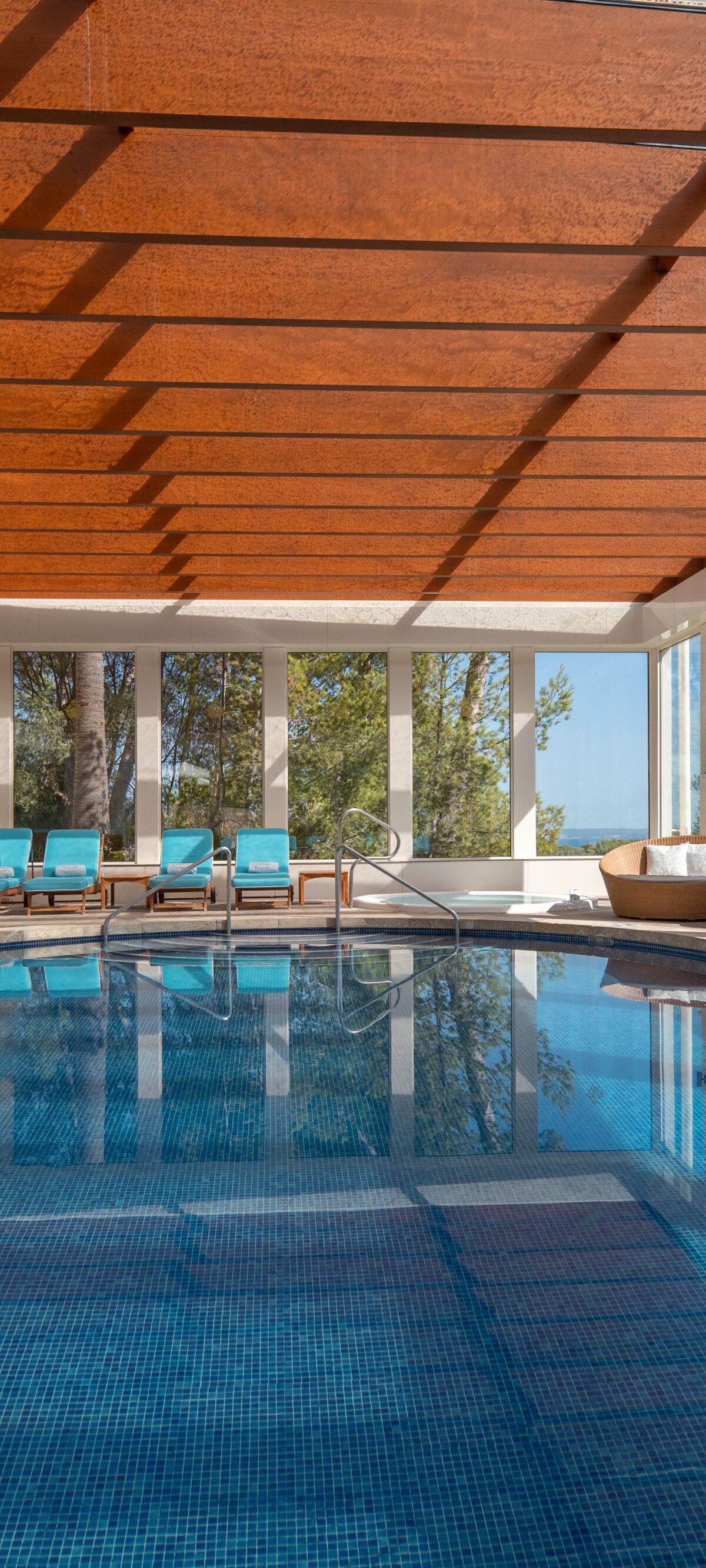 Indoor pool with panoramic views