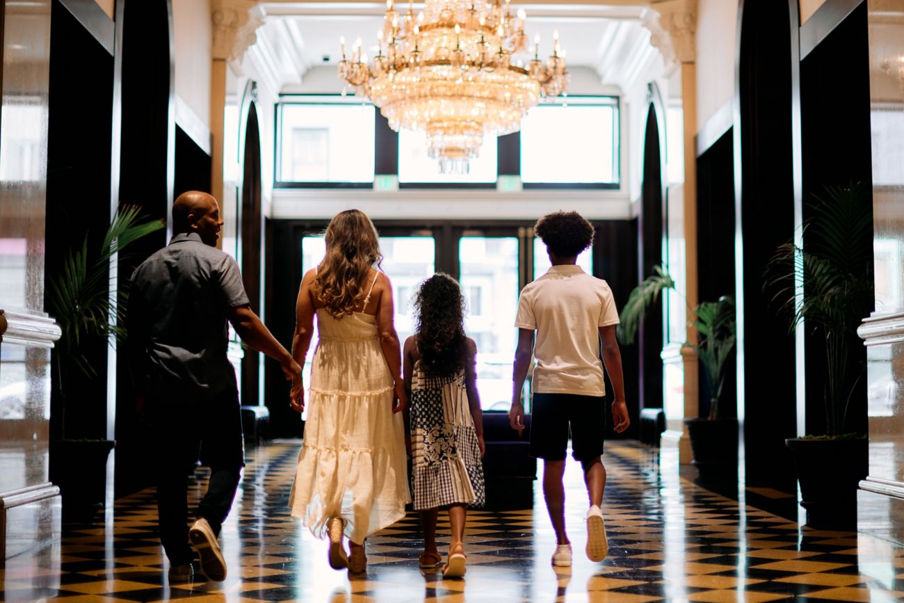 Family walking through lobby entrance. 