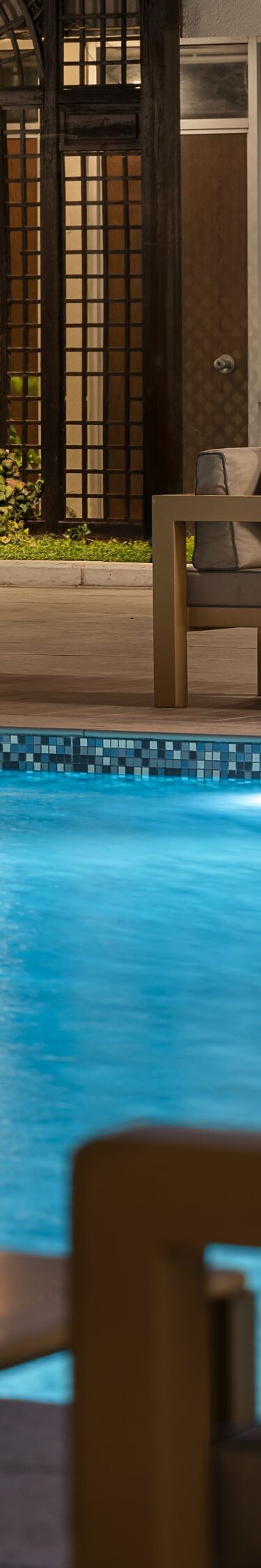 Outdoor pool area at night