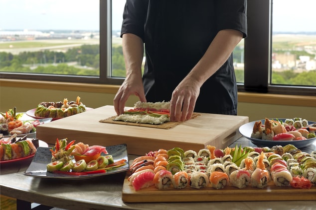 Sushi, chef rolling sushi