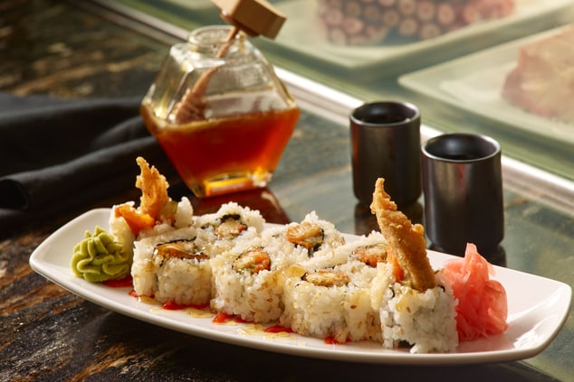 fried chicken sushi roll with honey jar