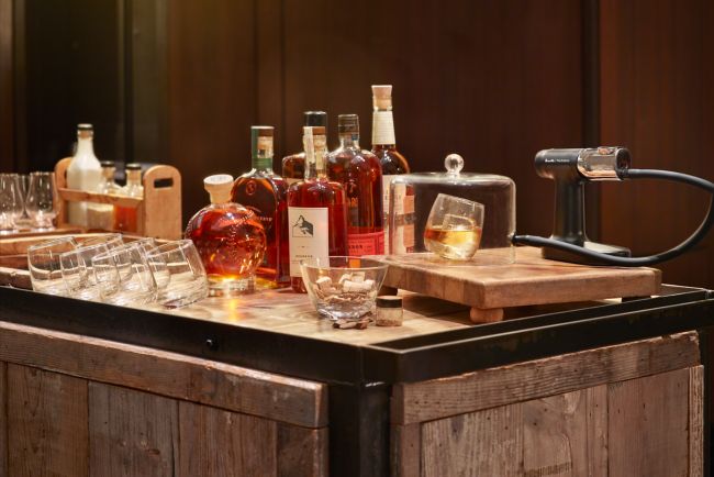 Bourbon bottles on a bar