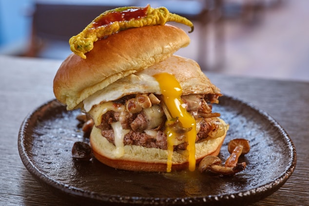 Steakhouse Burger with a Brioche bun, fried egg.