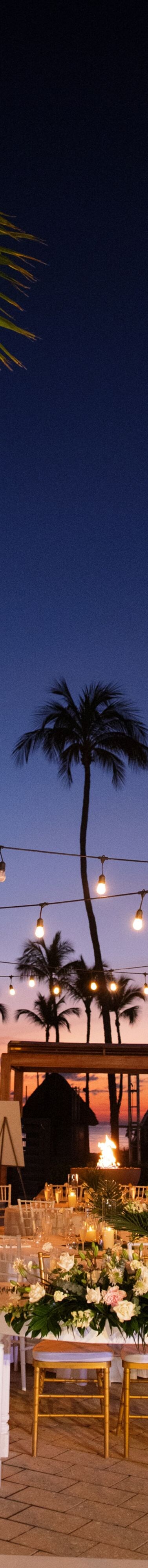 Outdoor wedding reception venue at dusk 