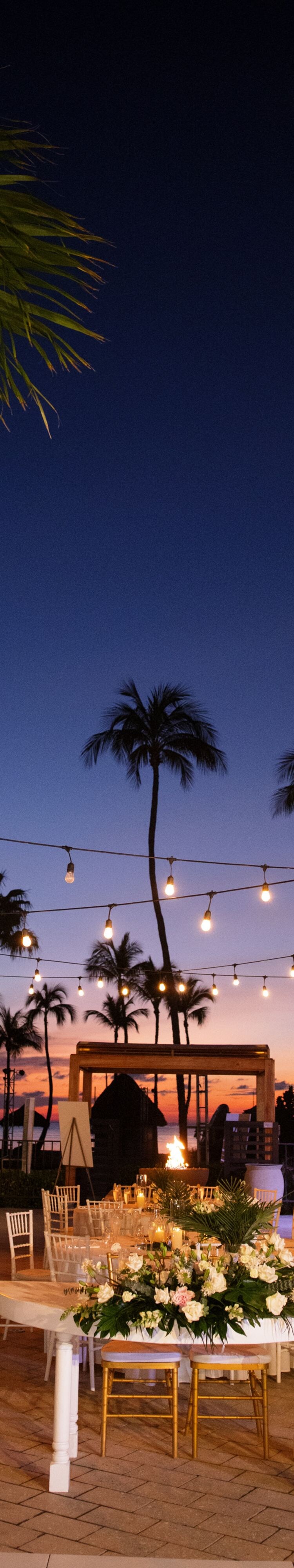 Outdoor wedding reception venue at dusk 