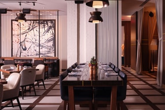 Long table with chairs in restaurant