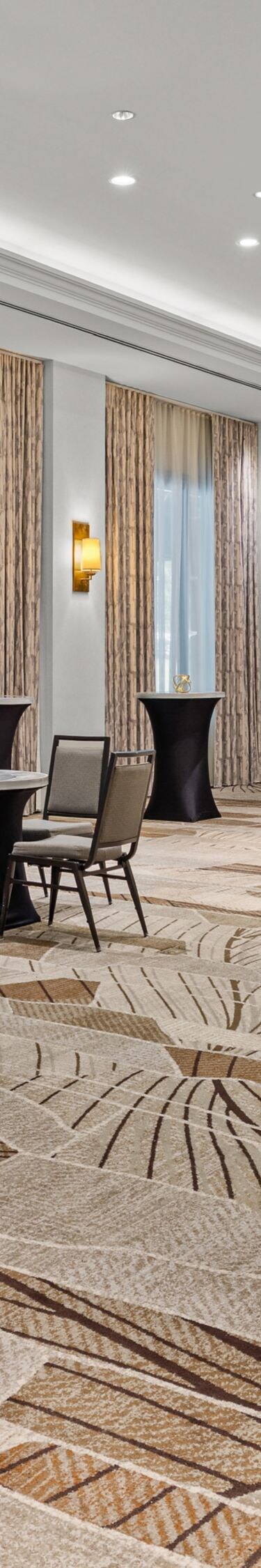 meeting room with cocktail tables, tables & chairs