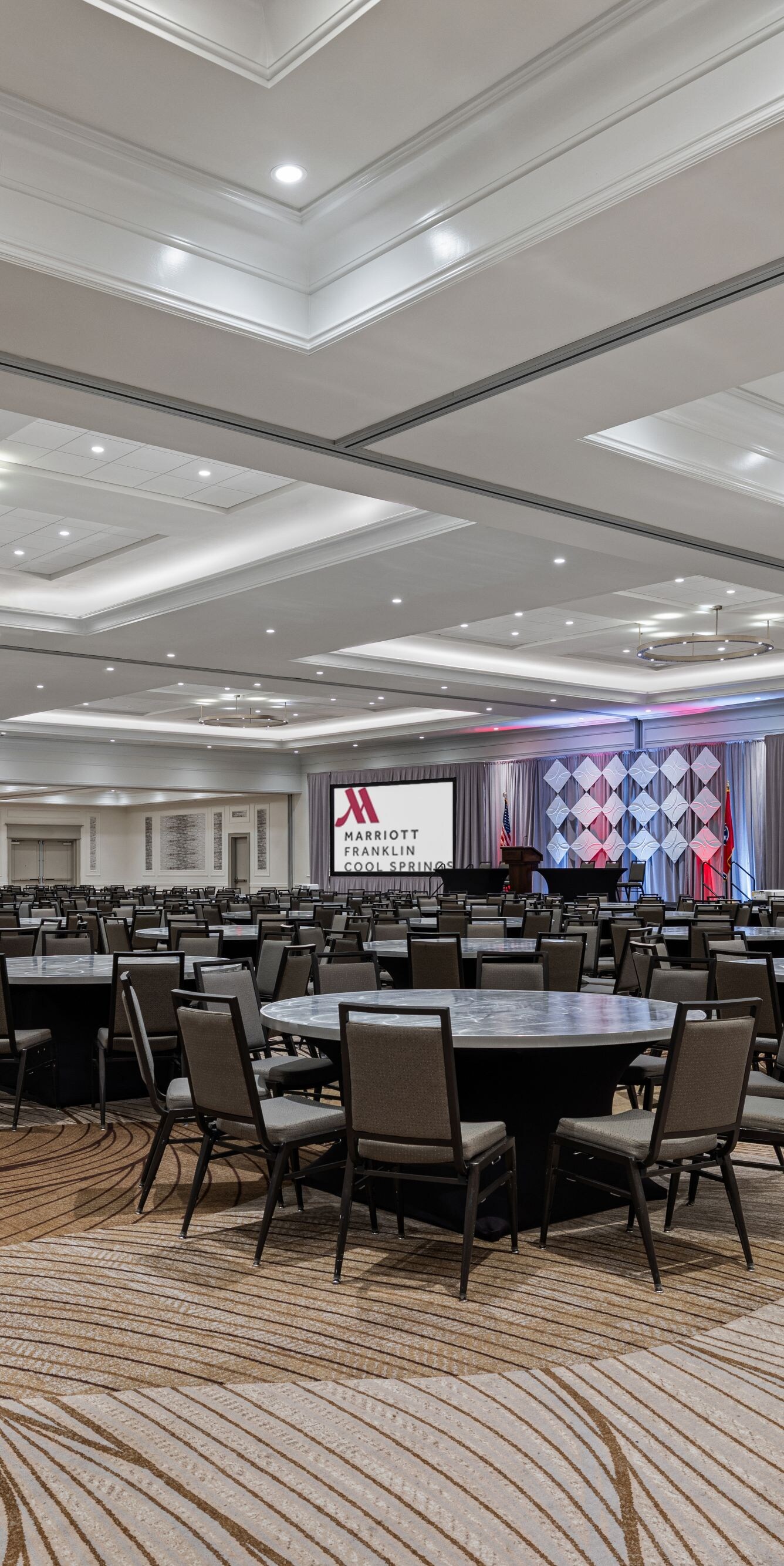 ballroom with round tables and chairs