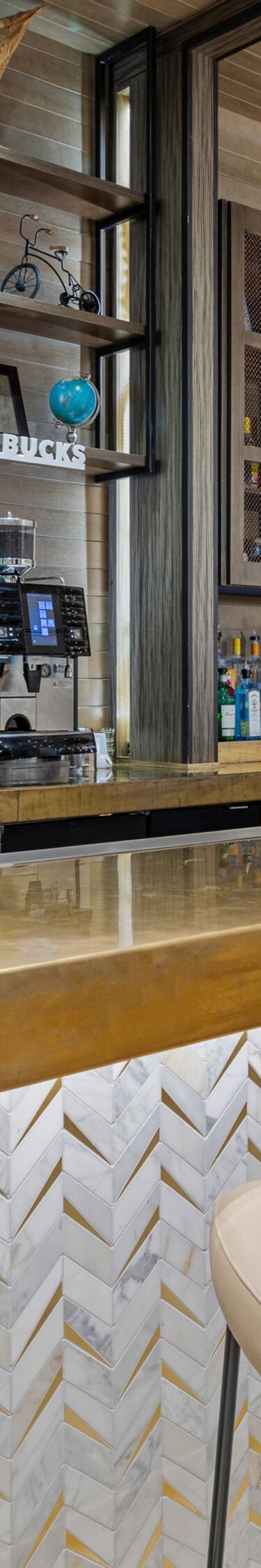 bar with chairs and coffee maker