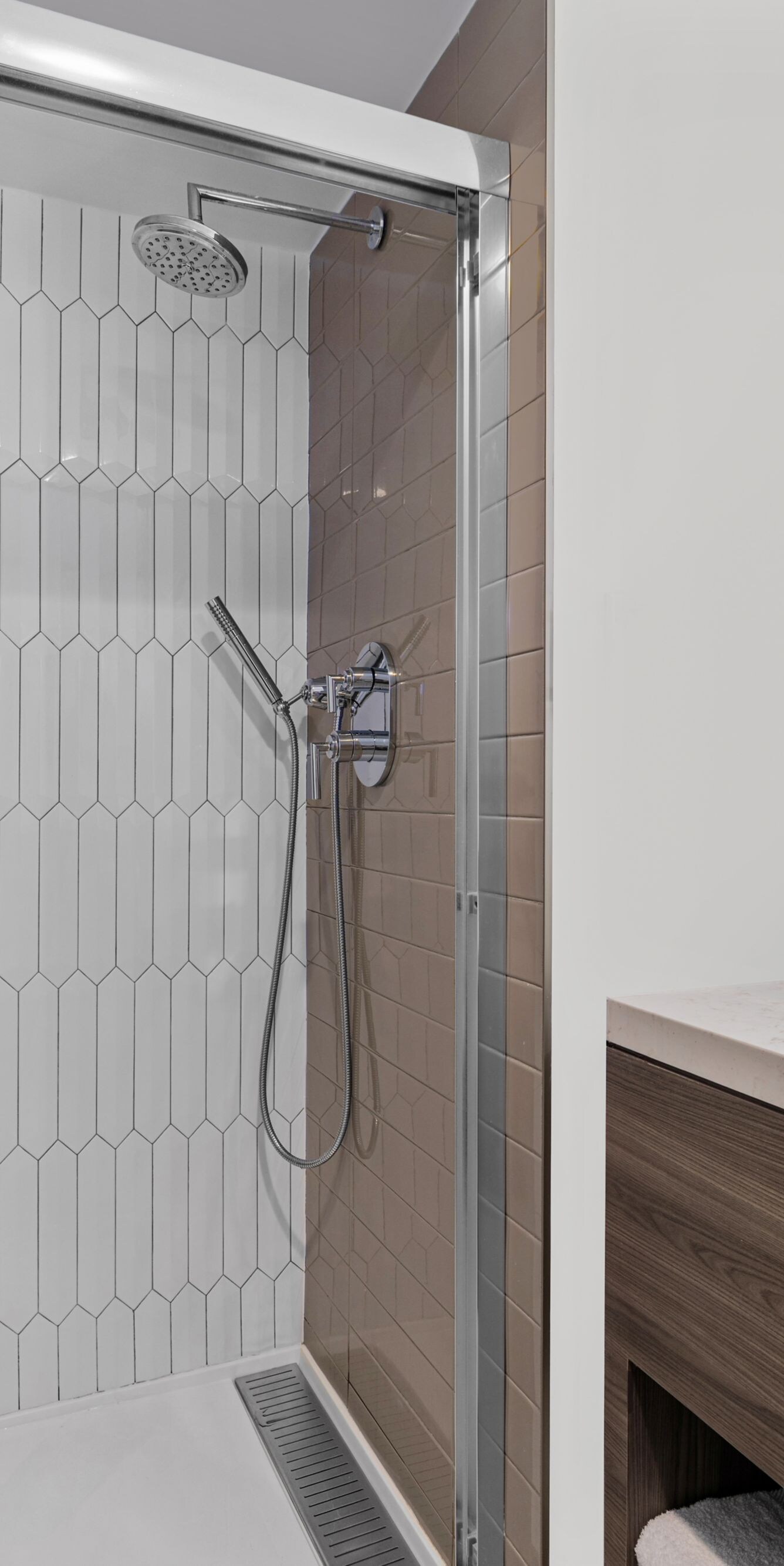 Guest bathroom with glass shower and vanity