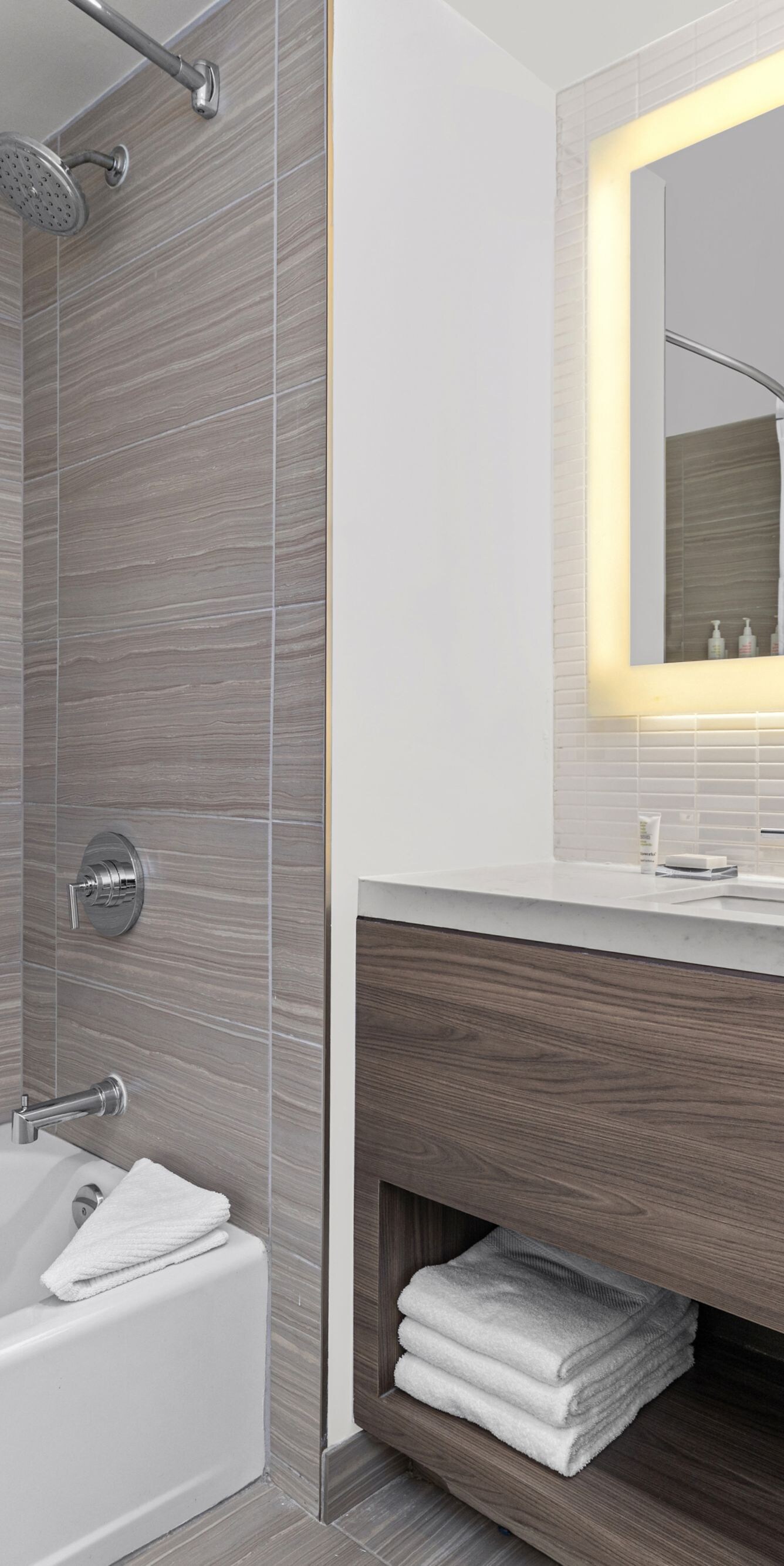 bathtub and sink with storage