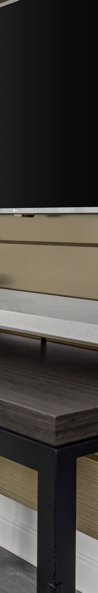 two tier desk with desk chair and lamps