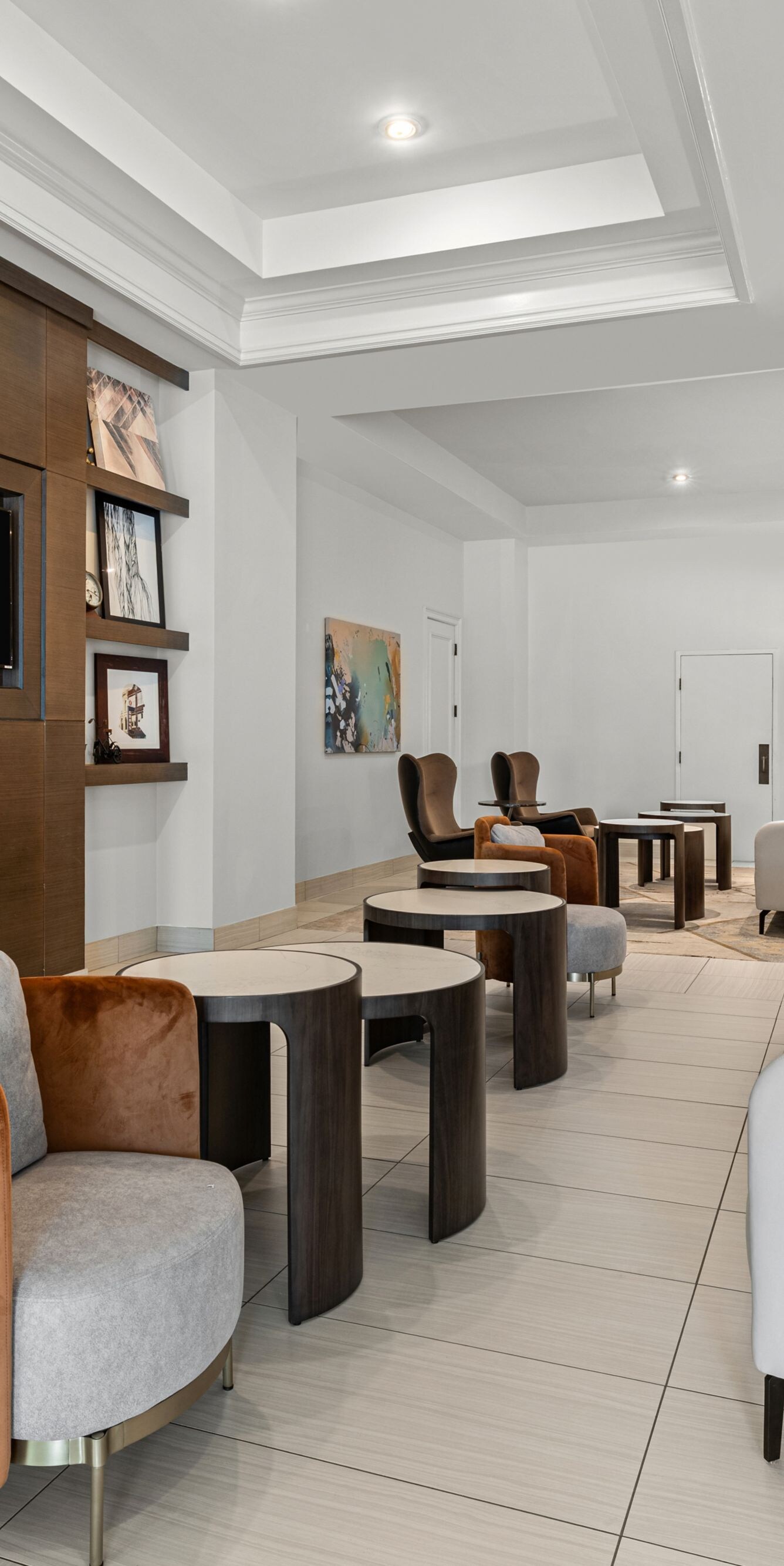 Lobby seating area with couches, chairs, tables