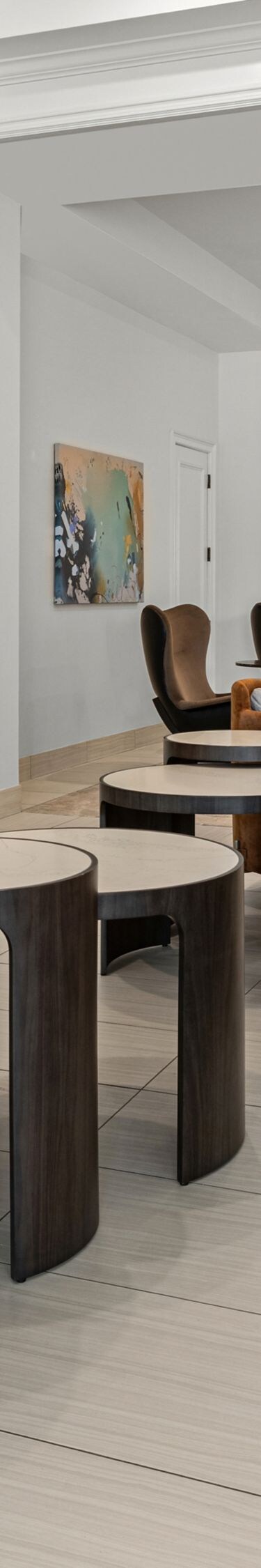 Lobby seating area with couches, chairs, tables