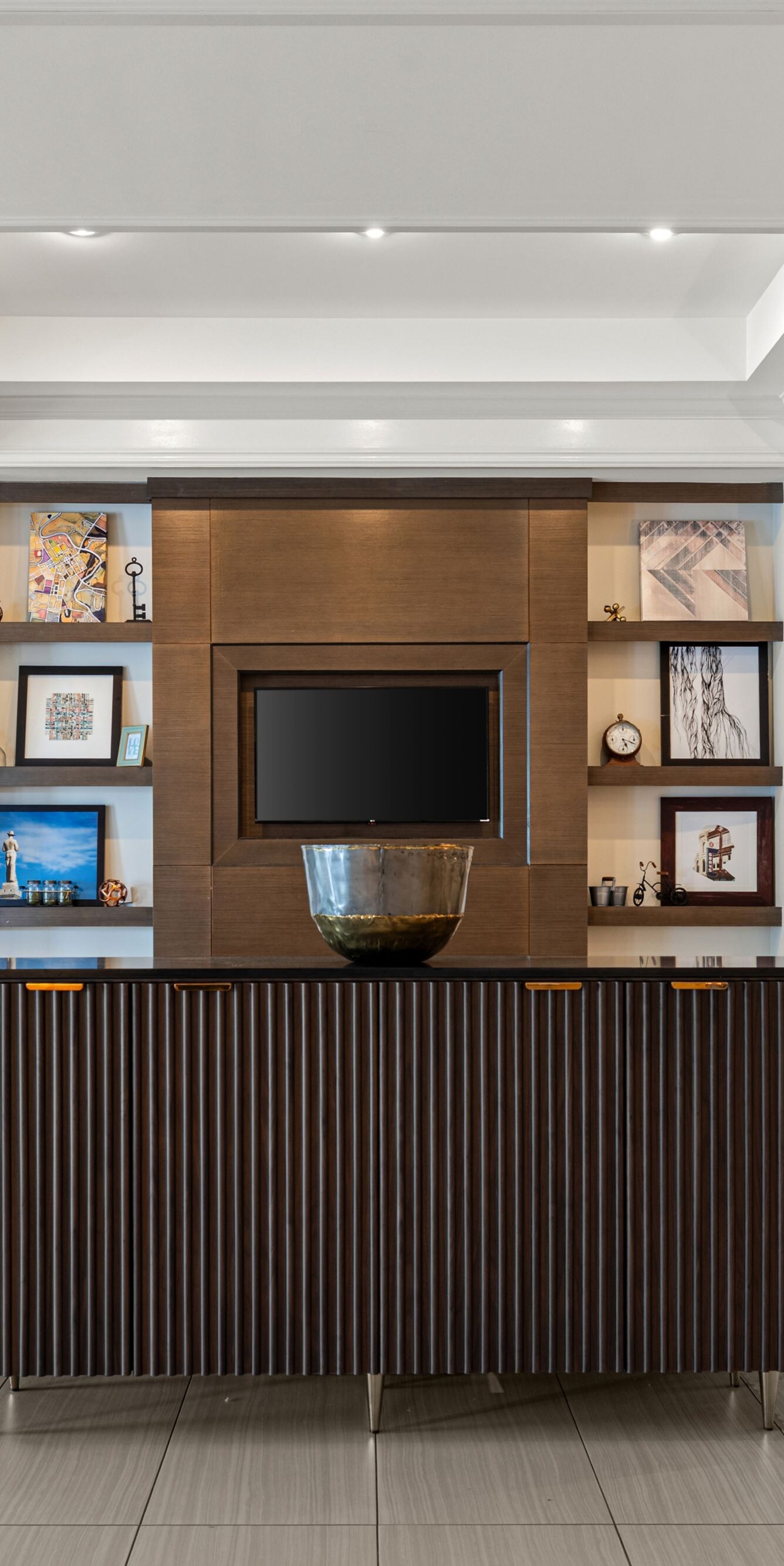 Lobby seating area with TV and sofas
