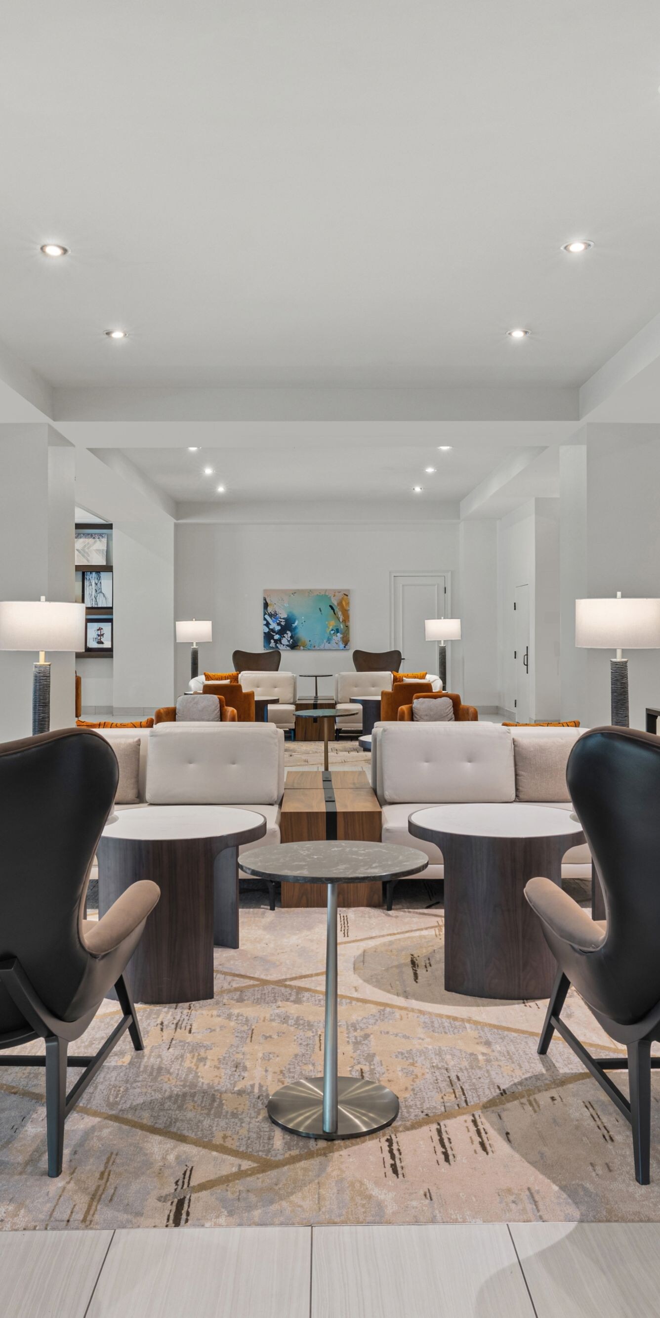 Lobby seating area with chairs and tables