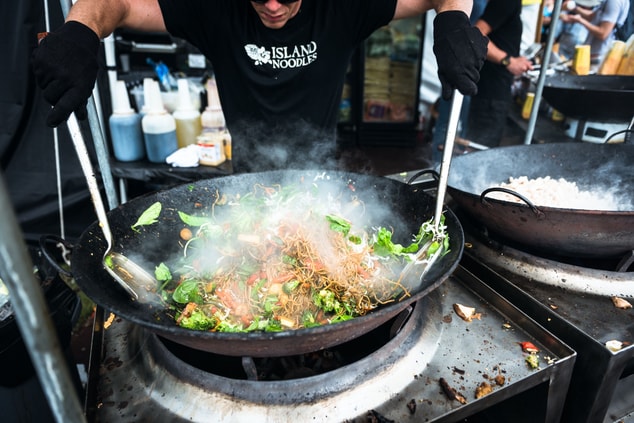 Noodles being cooked in a Wok