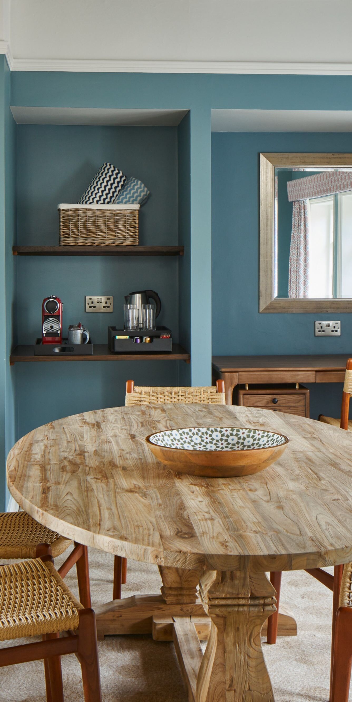 Cottage suite dining area with wooden table