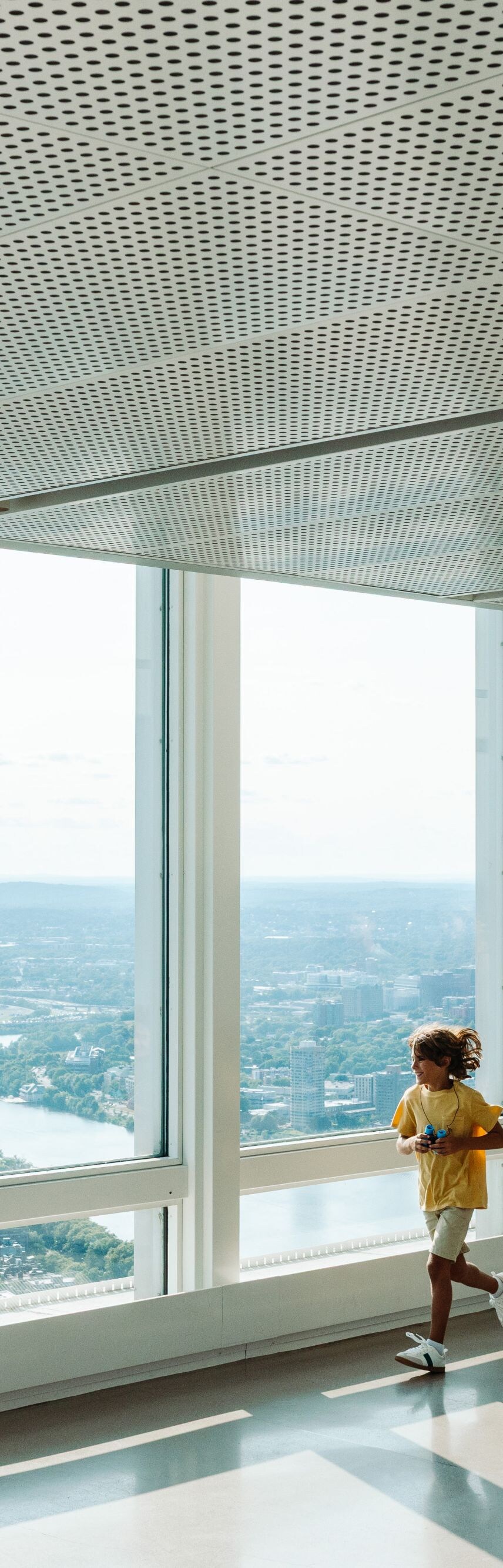 Family enjoying Boston skyline views.