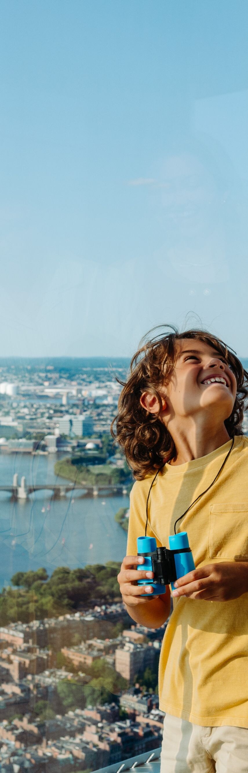 Family enjoying Boston skyline views.