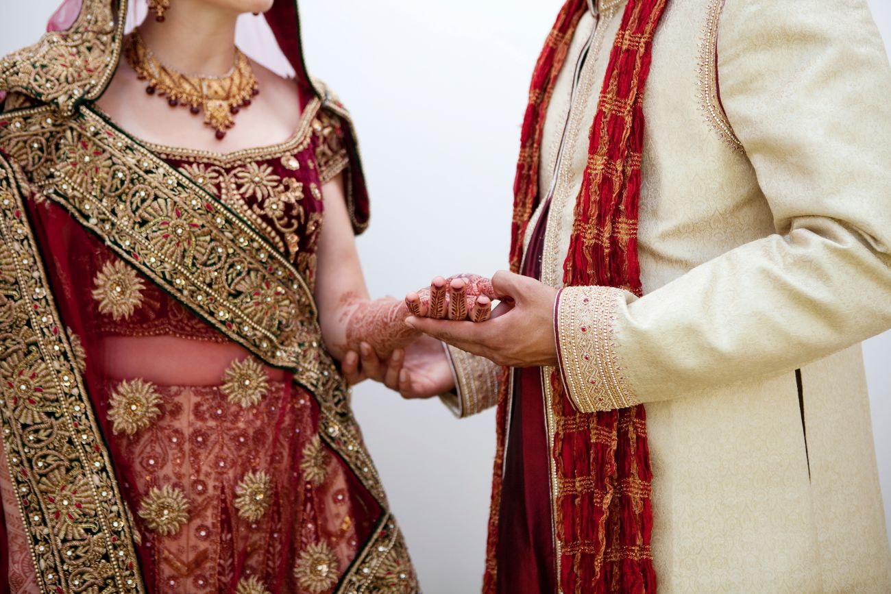 bride and groom in traditional Indian clothing