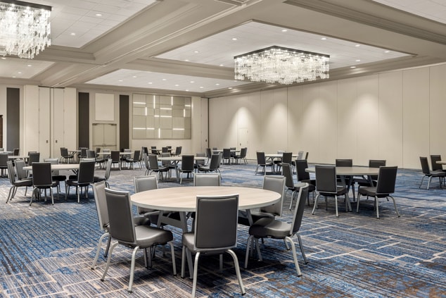 ballroom space with tables set in rounds
