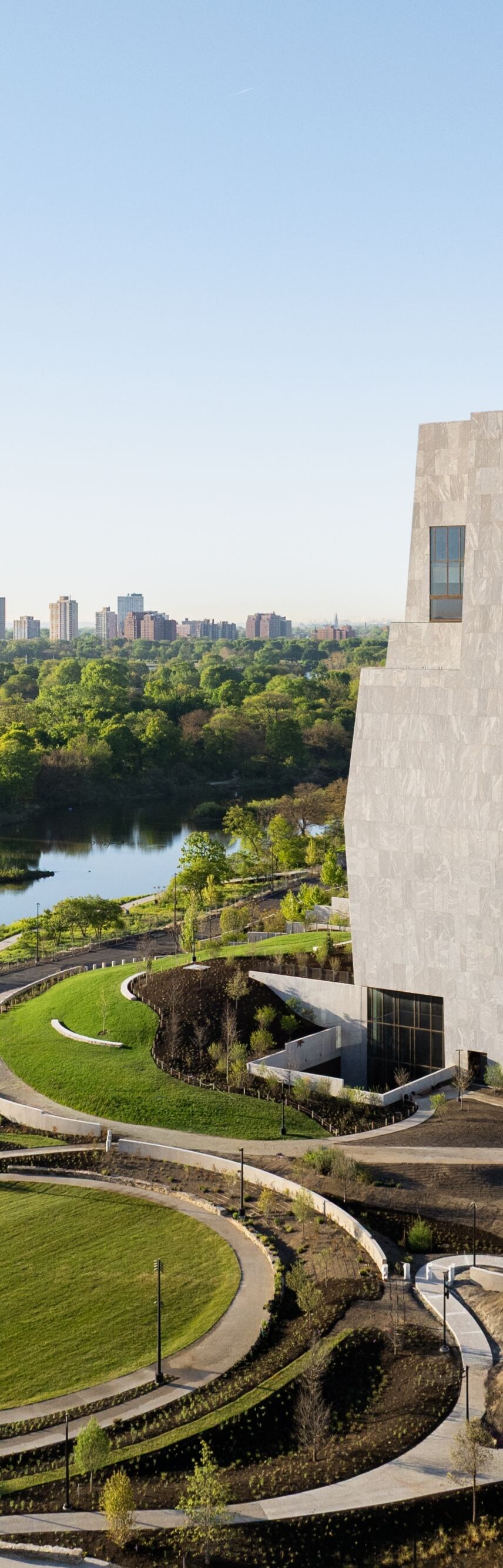Modern building with park and city views