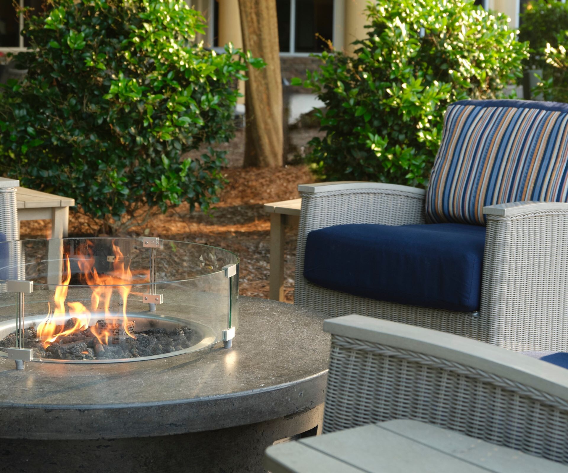 Outdoor patio with fire pit and seating