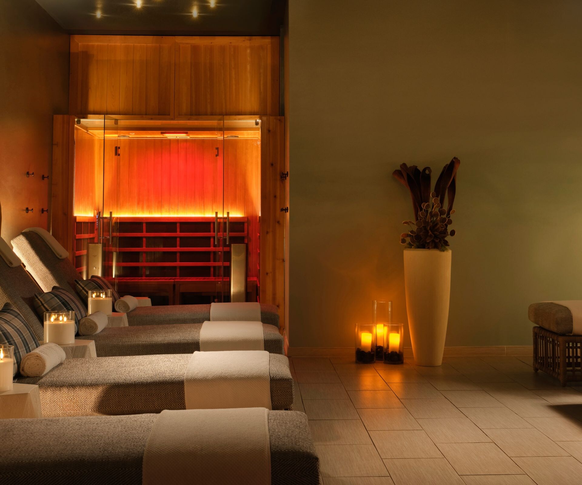 Spa relaxation room with sauna and candles
