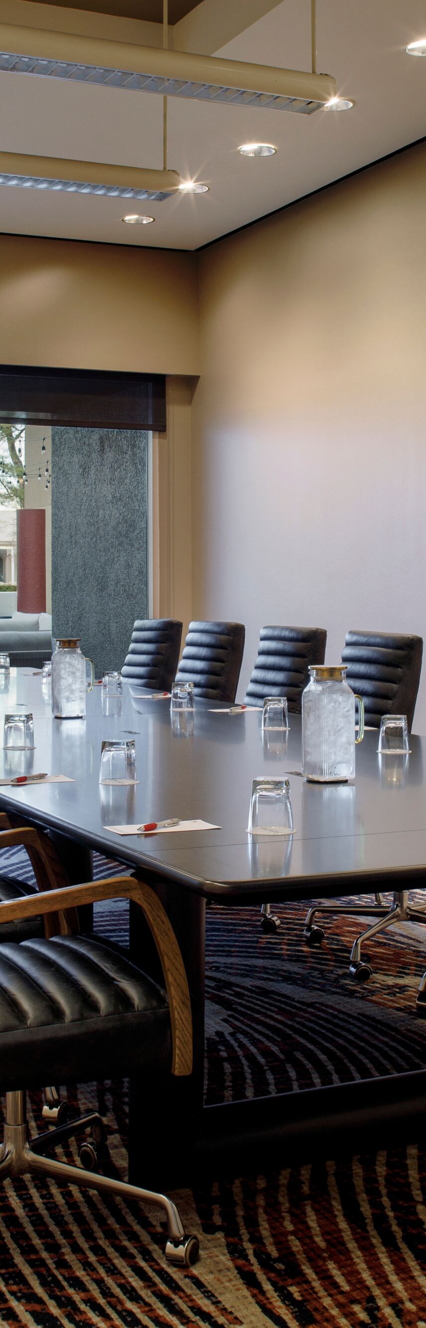 large table, 15 chairs and artwork