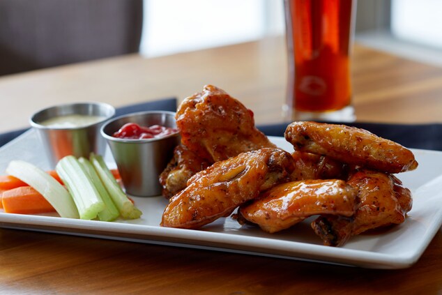 Wings on a plate with celery and carrots