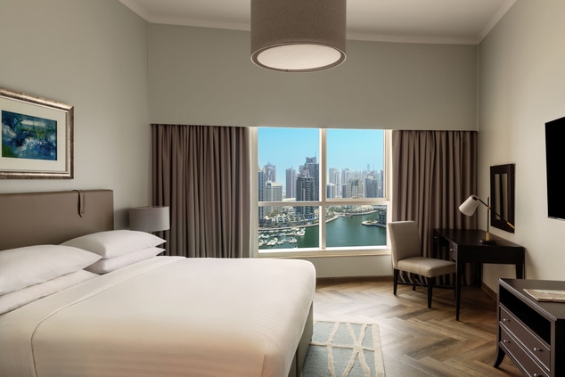 Queen sized bedroom with views of Dubai Marina