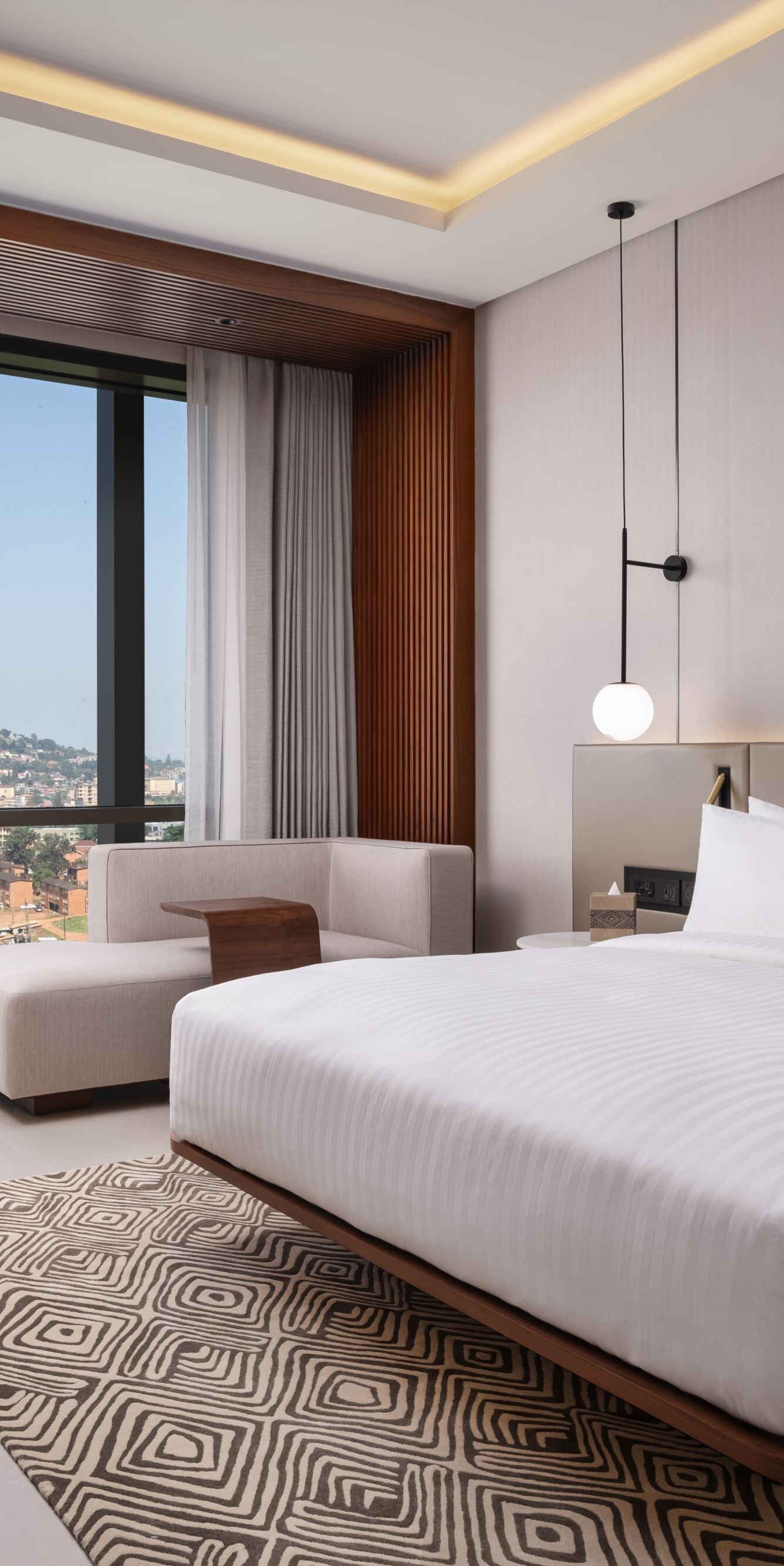 King guest room with city view and desk