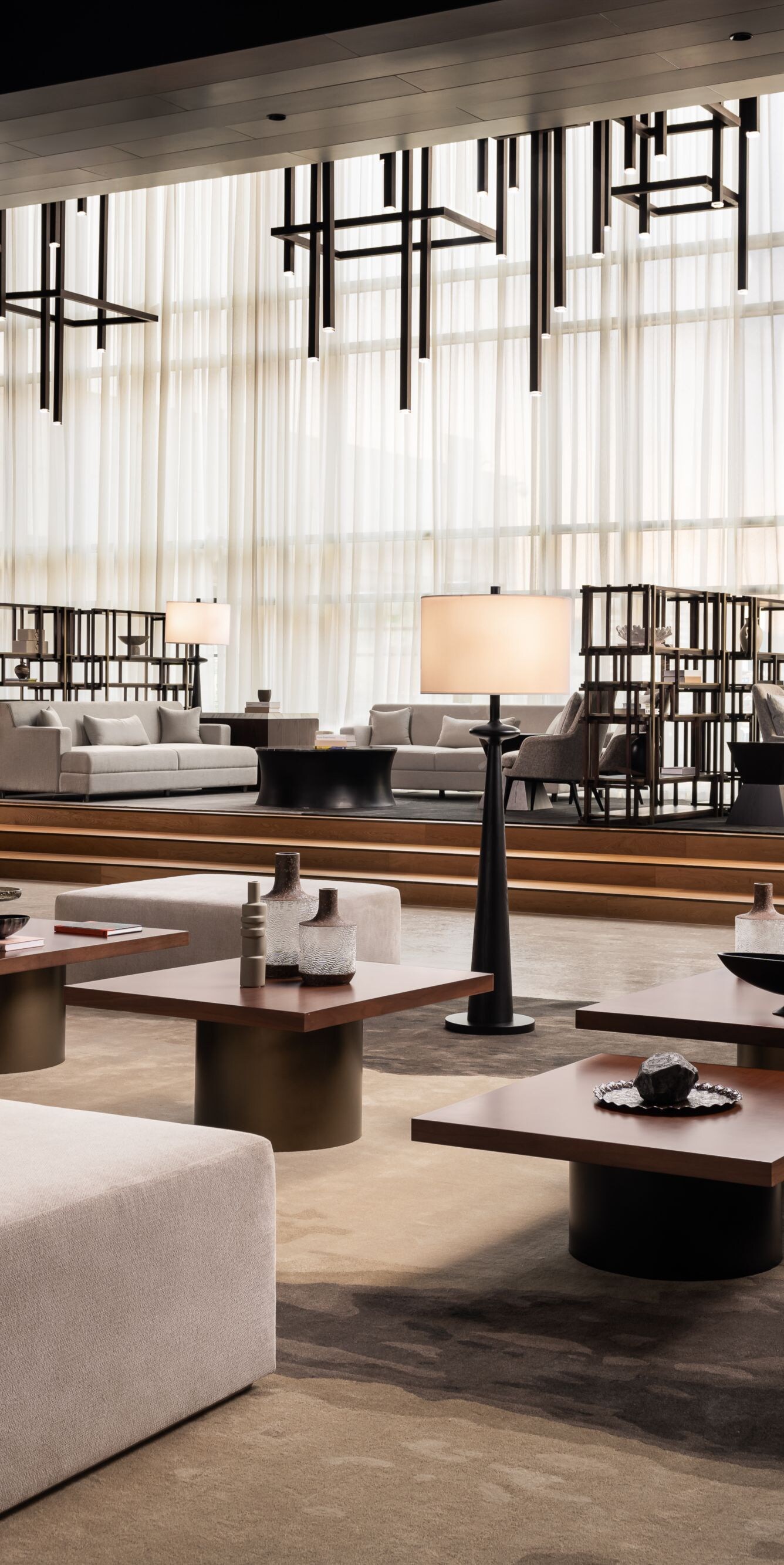 Lobby with modern seating and tall windows