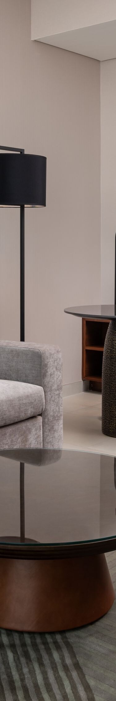 Suite living area with sofa and desk